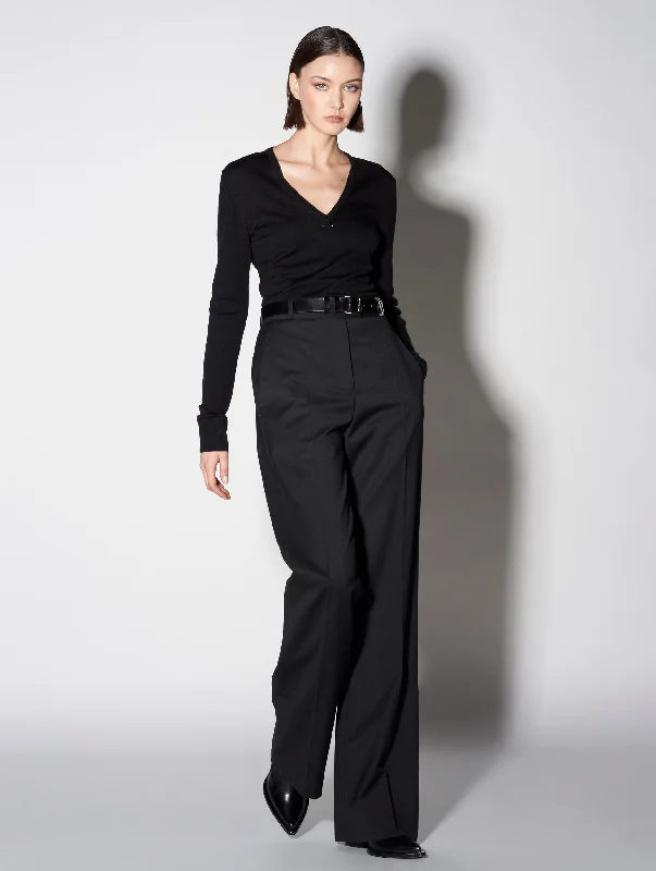 Timeless Elegance Redefined Black merino knit V-neck sweater with piercing detail